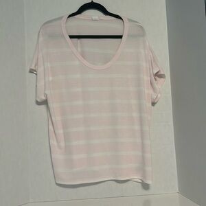 T shirt. 12 inches from arm pit to hem. Light pink and white stripes.